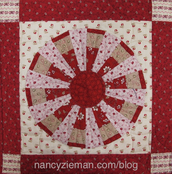 Ferris Wheel Quilt Pattern by Nancy Zieman featuring Garnet fabric by Penny Rose