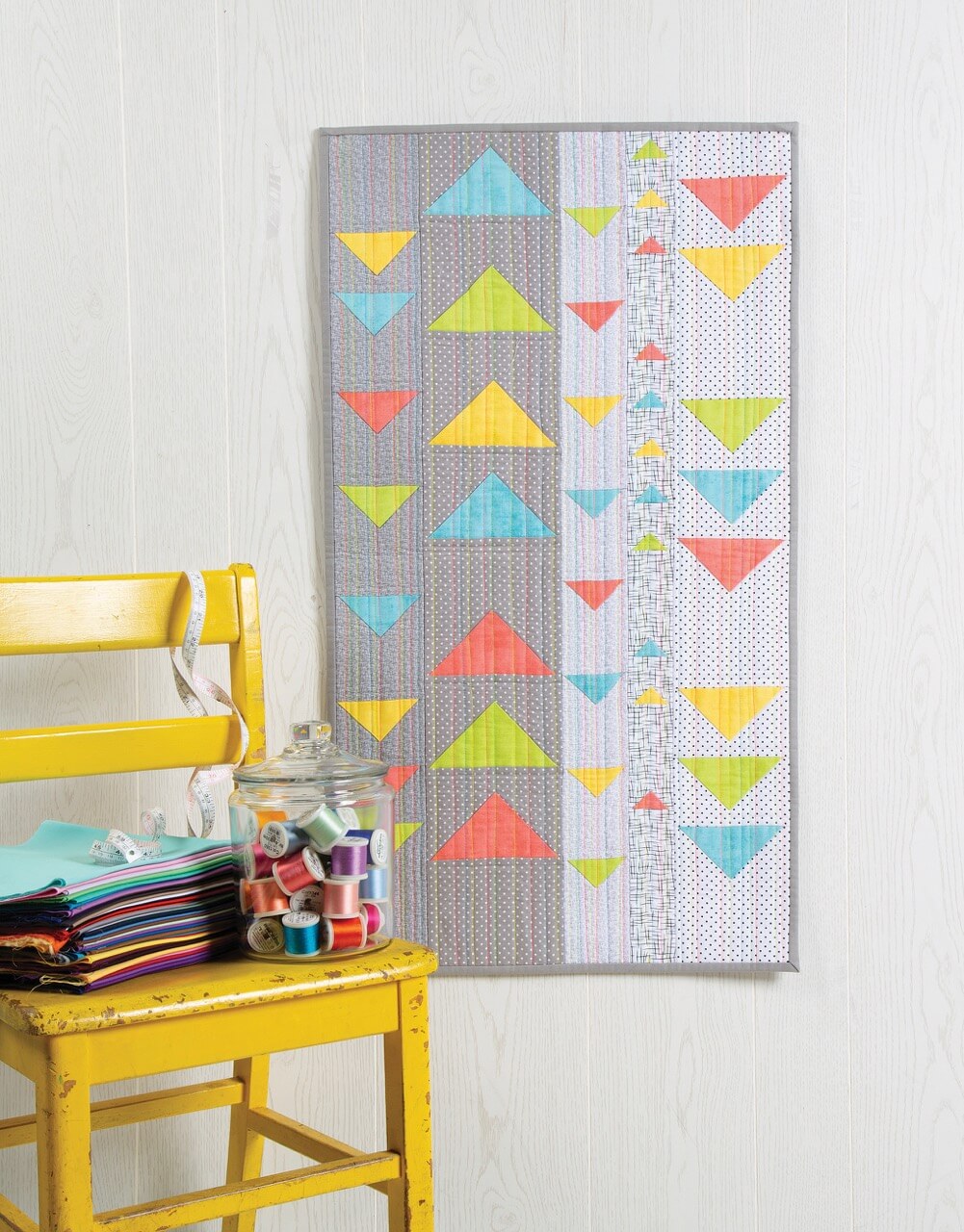 NEW! Modern Floating Triangles Wall Hanging and Table Runner Pattern by Nancy Zieman Productions.