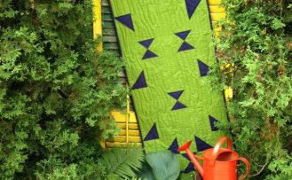 No-Hassle Triangles Summer Table Runner Sewing Tutorial at the Nancy Zieman Productions Blog