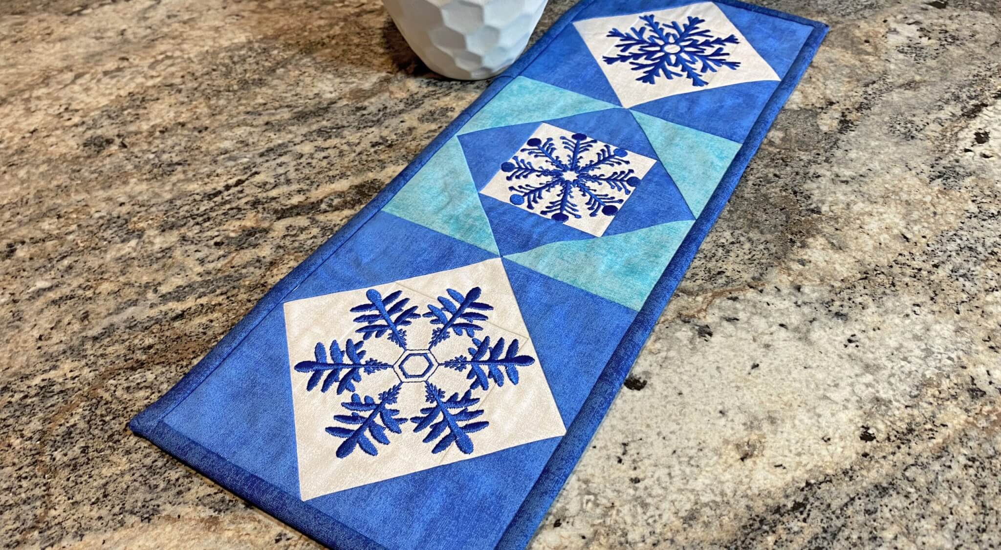 Quick Quilting in the Hoop Winter Snowflakes Embroidery Collection Mini Wall Quilt scaled