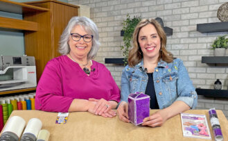 Deanna Springer and guest Kari Coffey on the set of Stitch it Sisters OESD Origami Gift Box Episode 1000 x 550