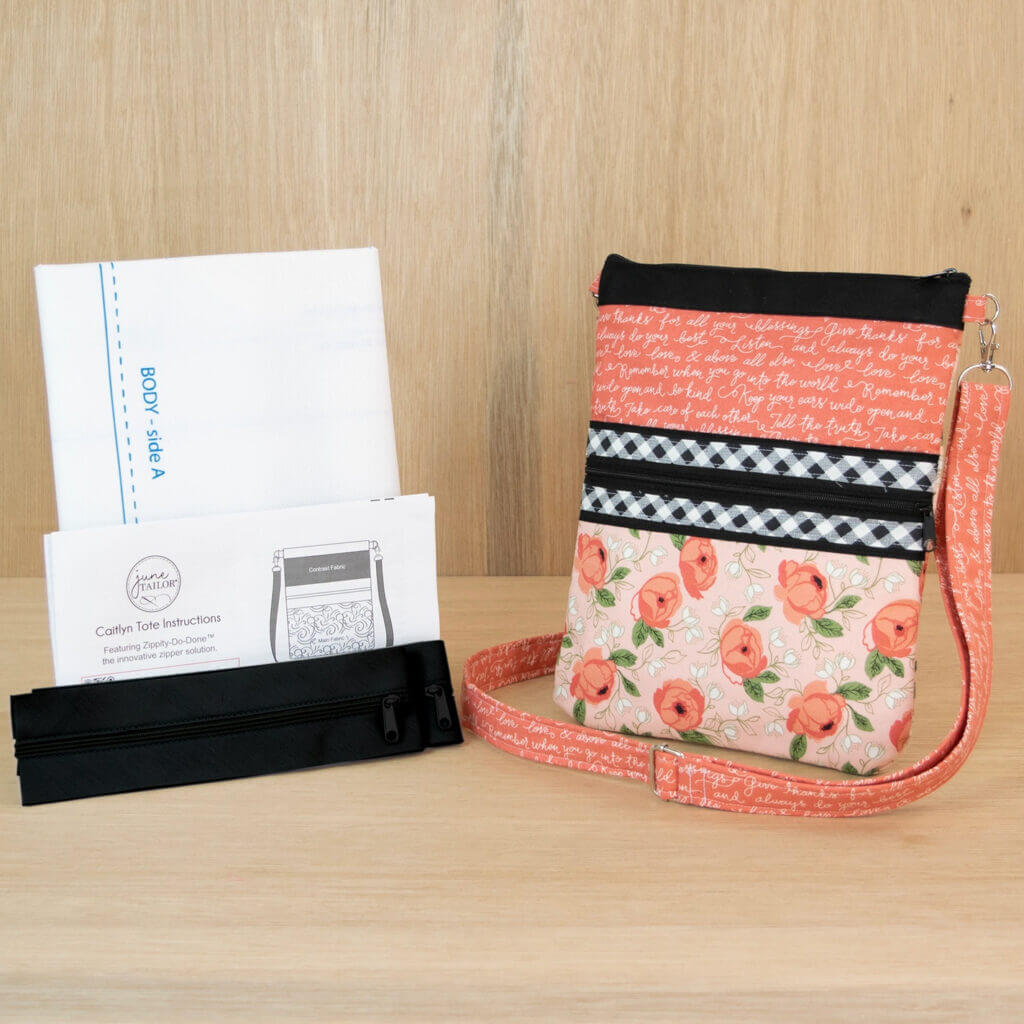 NEW!  Stitching on the line with the Caitlyn Crossbody Tote.